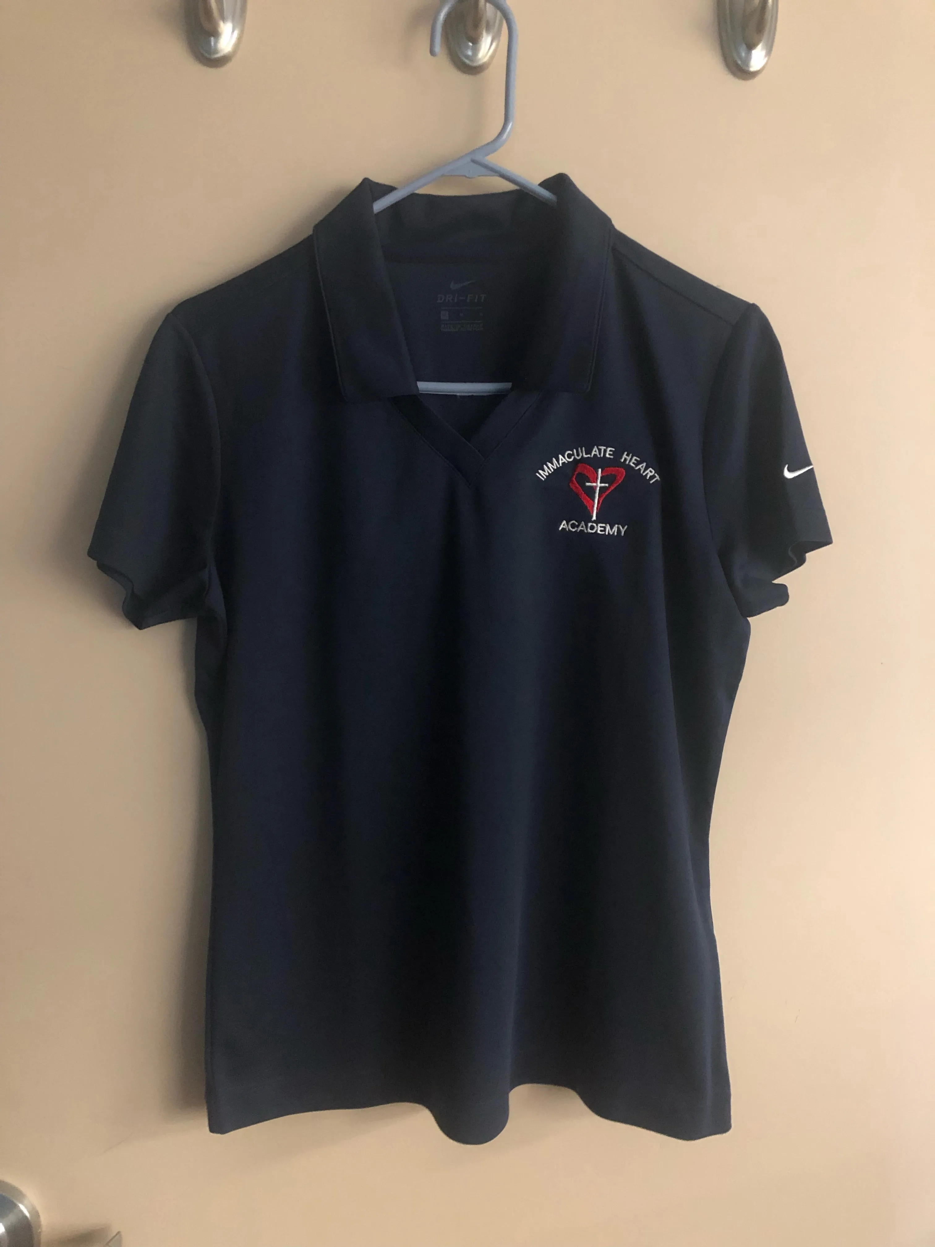 IHA Women's NIKE Golf Shirt