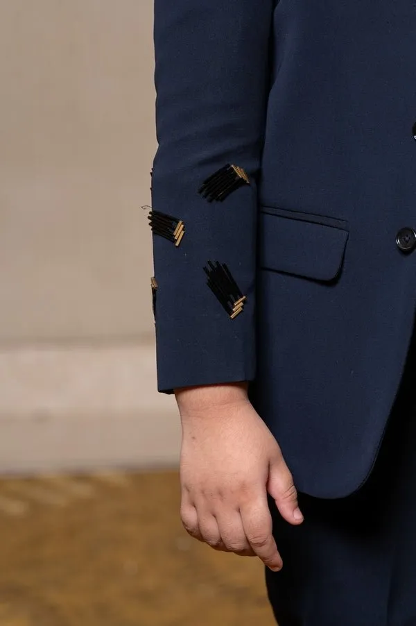 Navy blue blazer with elegant metallic embroidery, paired with matching trousers and a crisp white shirt for a refined formal look