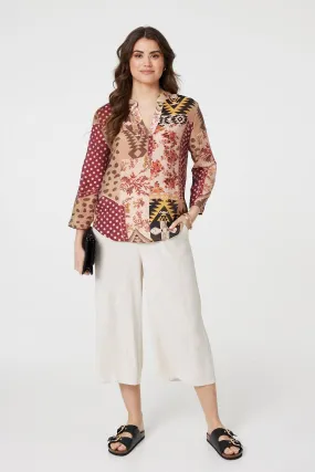 Patchwork Print Curve Hem Blouse